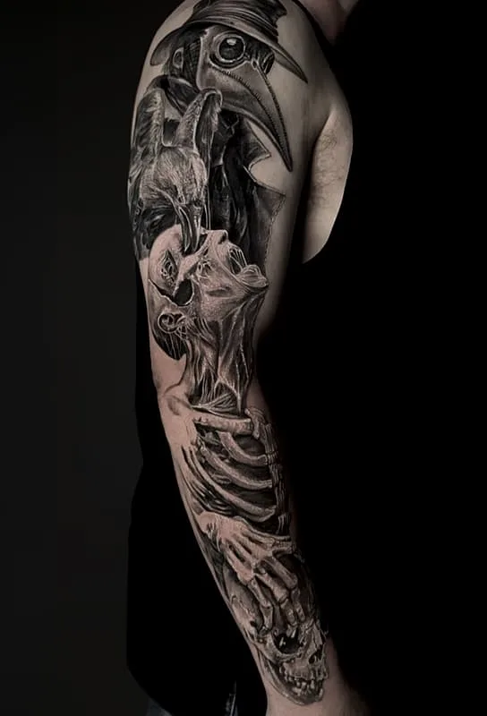 Detailed black-and-grey full-sleeve tattoo of a skeleton and plague doctor.