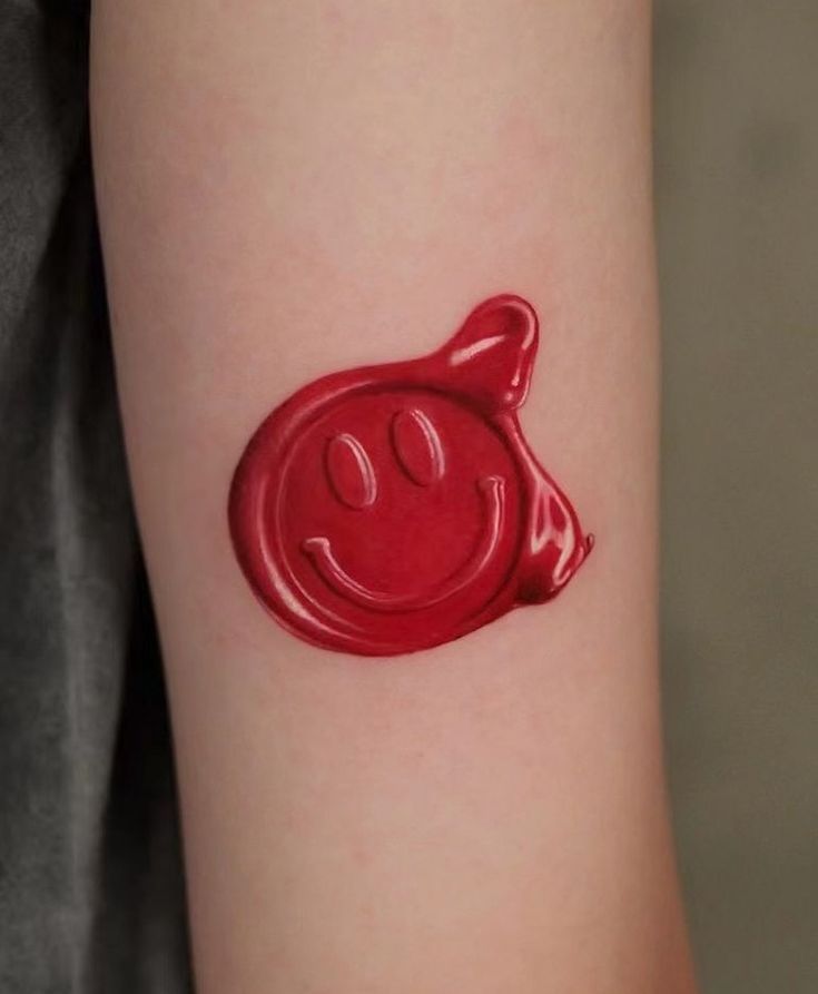 Playful 3D Smiley Face Wax Stamp Tattoo