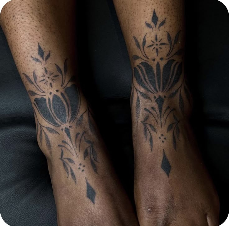 Elegant Blackwork Ankle Tattoo Design