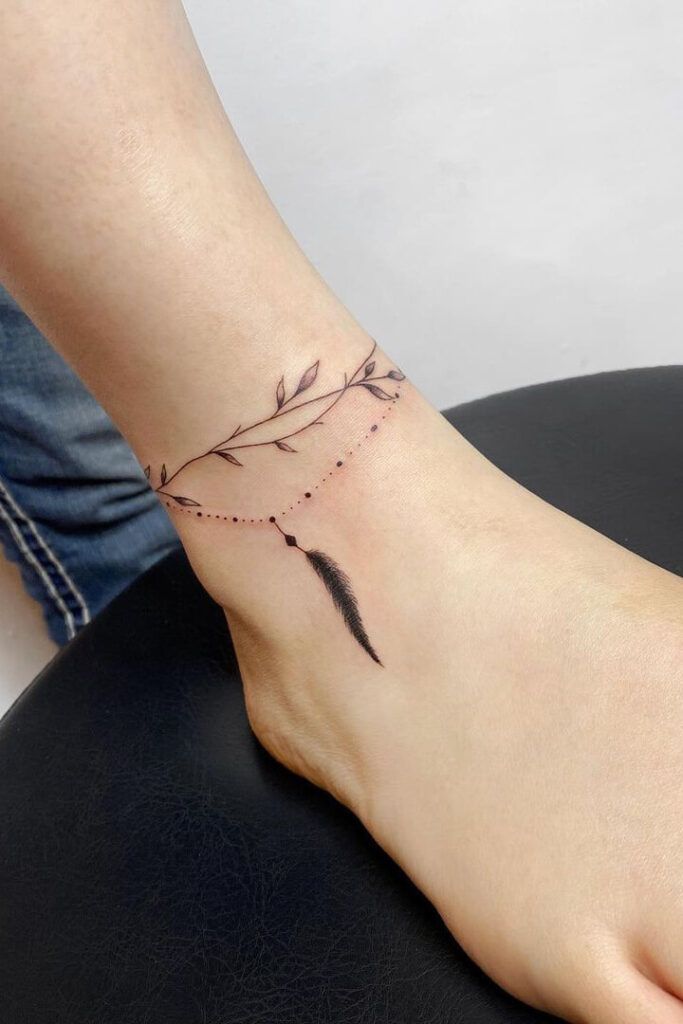 Elegant Floral Ankle Tattoo Design