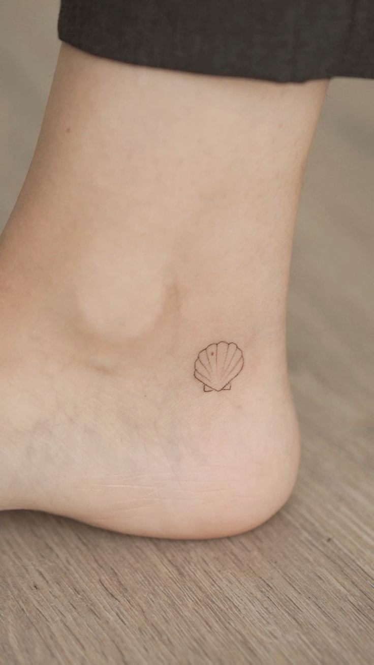 Delicate Shell Ankle Tattoo