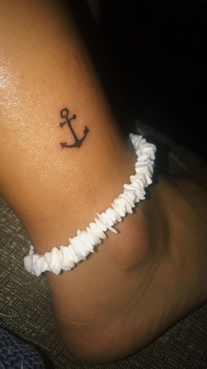 Charming Minimalist Anchor Tattoo on Ankle