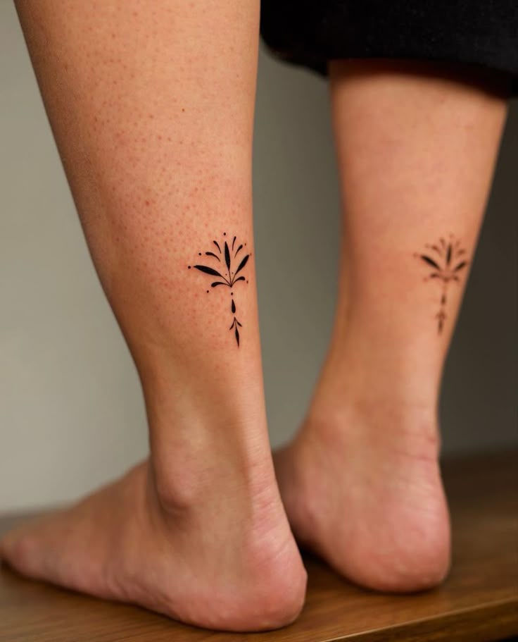 Elegant Blackwork Ankle Tattoo Design