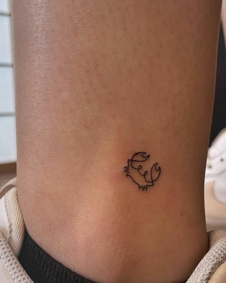 Charming Minimalist Crab Ankle Tattoo
