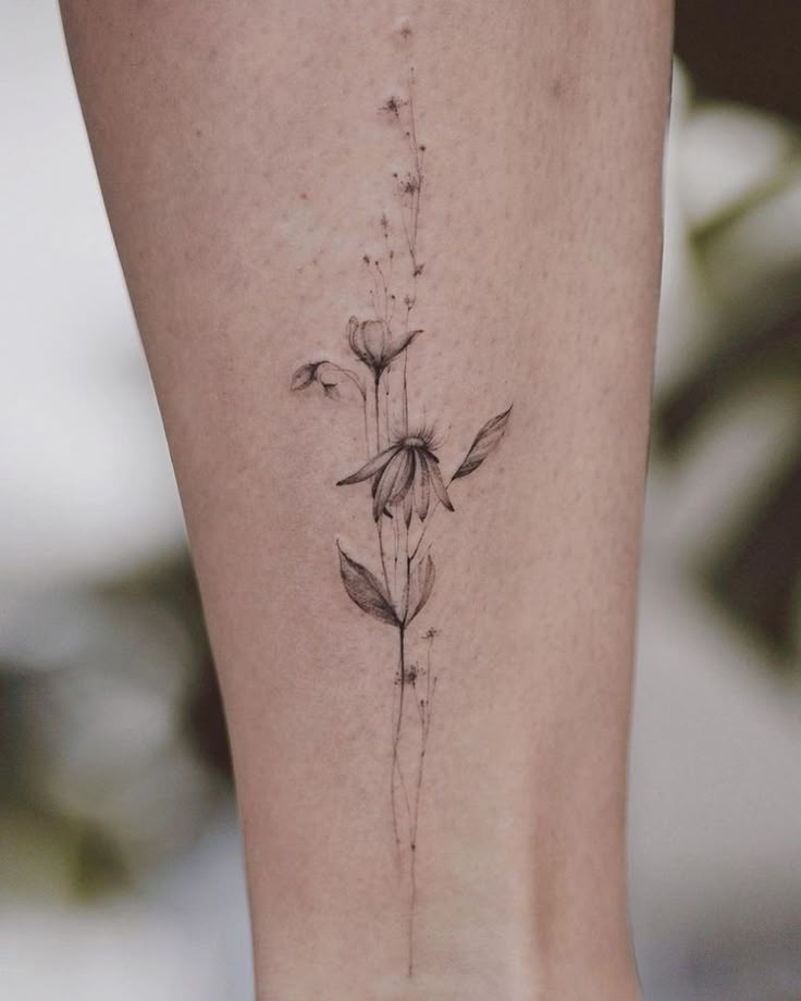 Delicate Floral Ankle Tattoo