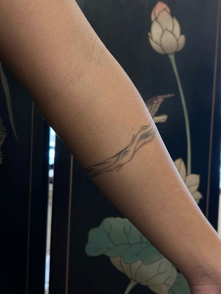 Elegant Watercolor Band Tattoo