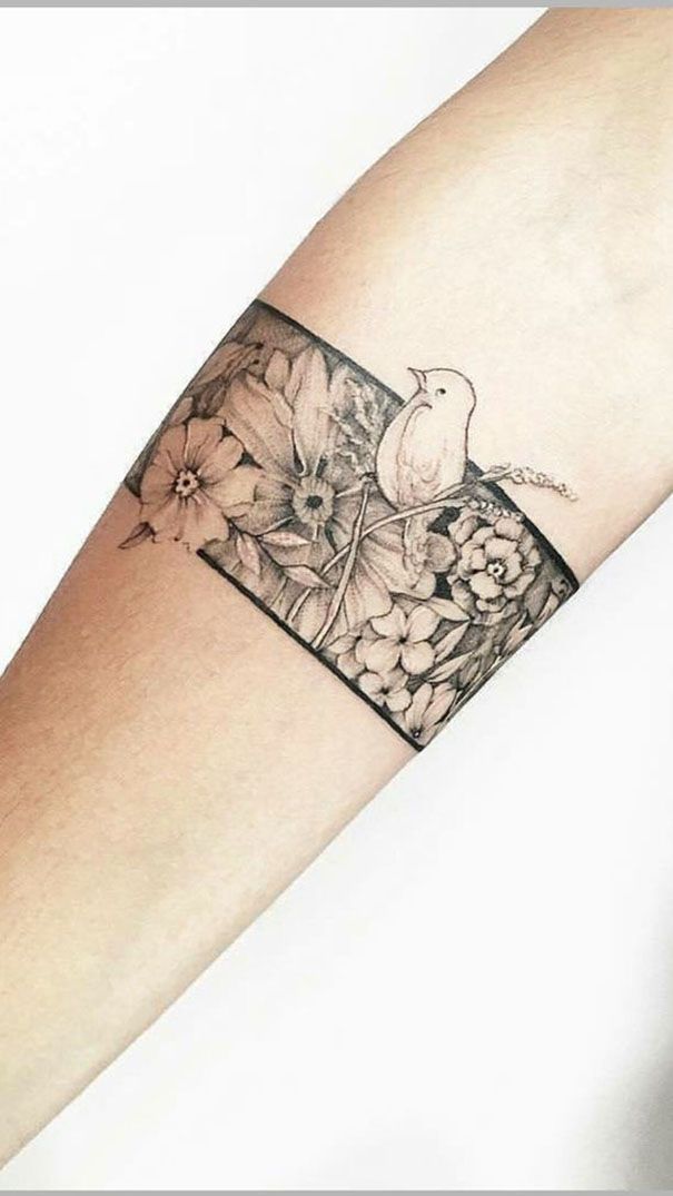 Nature-Inspired Armband Tattoo with Bird and Flowers