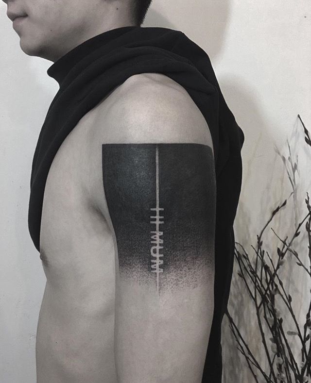 Bold Geometric Arm Tattoo