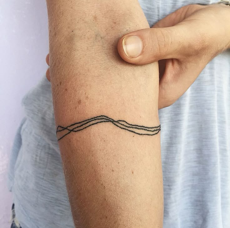 Elegant Minimalist Forearm Tattoo