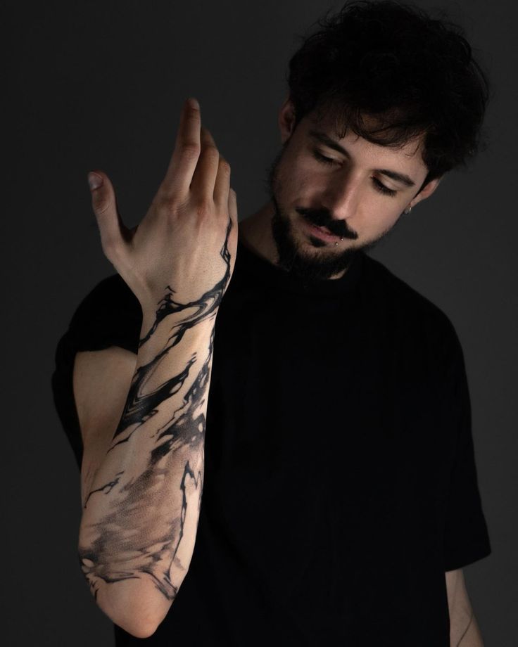Stunning Realistic Arm Tattoo for Men