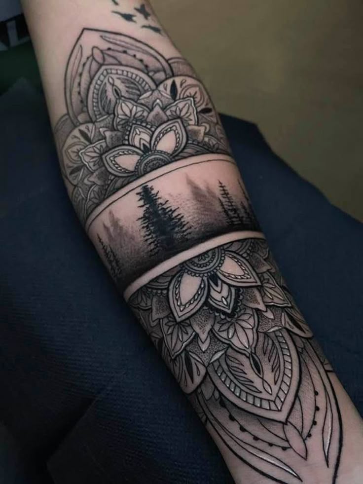 Nature-Inspired Blackwork Forearm Tattoo