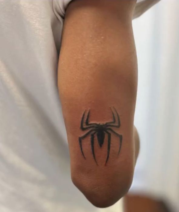 striking blackwork spider tattoo design
