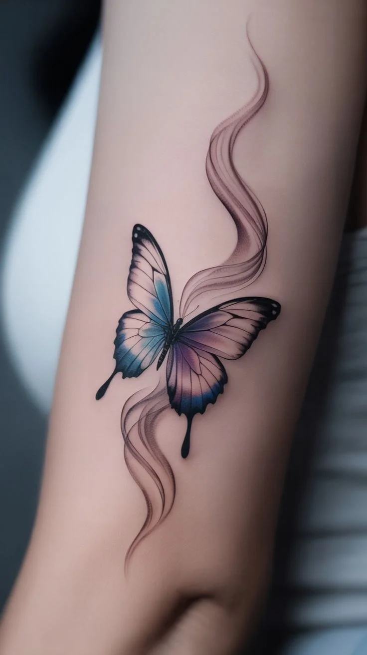 vibrant butterfly arm tattoo for women