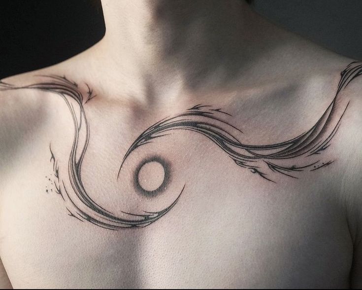 flowing abstract chest tattoo design