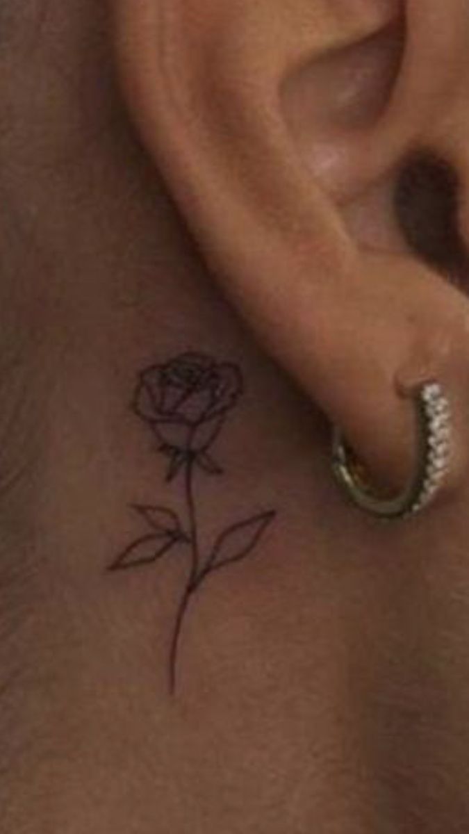 Delicate Rose Behind the Ear Tattoo