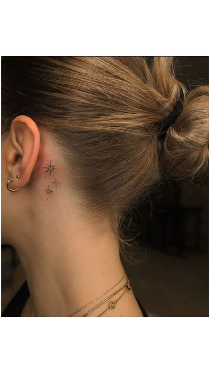Charming Minimalist Star Tattoos Behind the Ear
