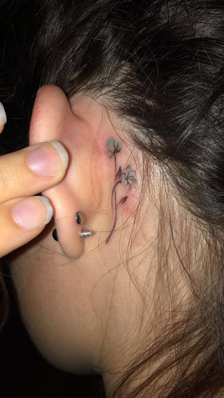 Delicate Floral Behind-the-Ear Tattoo