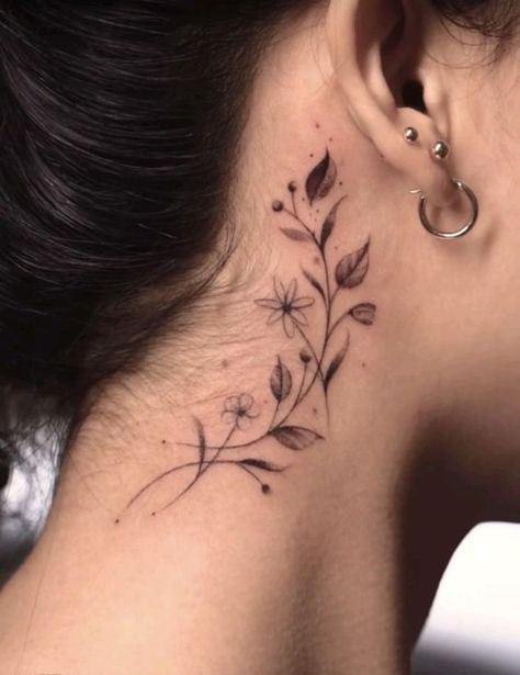 Delicate Floral Tattoo Behind the Ear