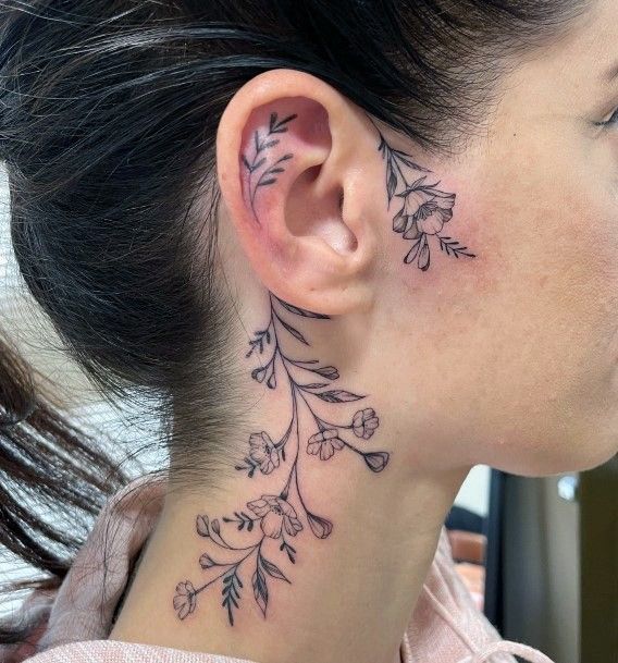 Elegant Floral Tattoo Behind the Ear