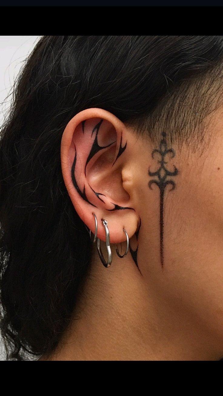 Elegant Blackwork Behind the Ear Tattoo
