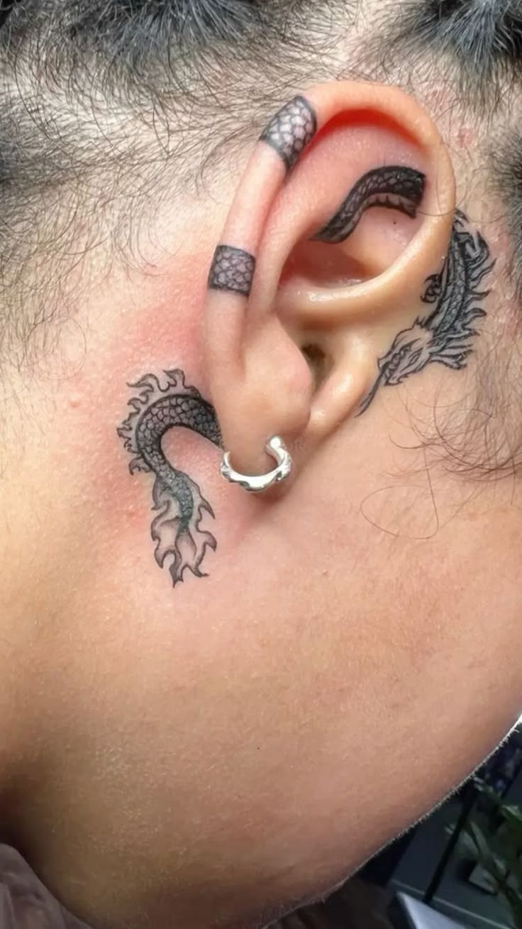 Intricate Blackwork Dragon Behind the Ear Tattoo