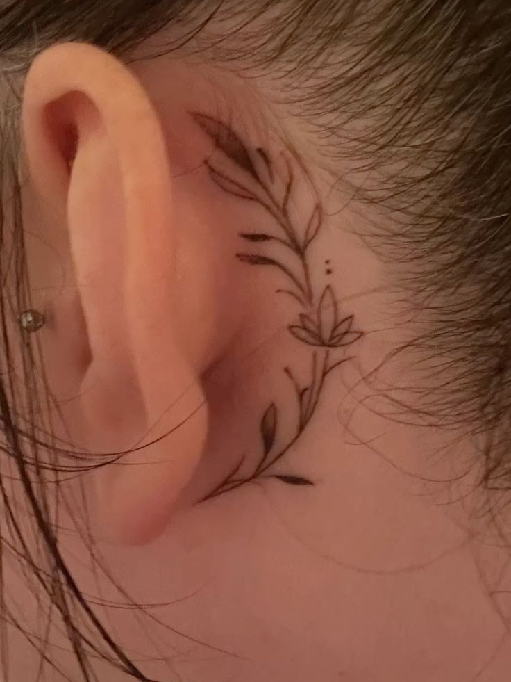 Delicate Floral Tattoo Behind the Ear