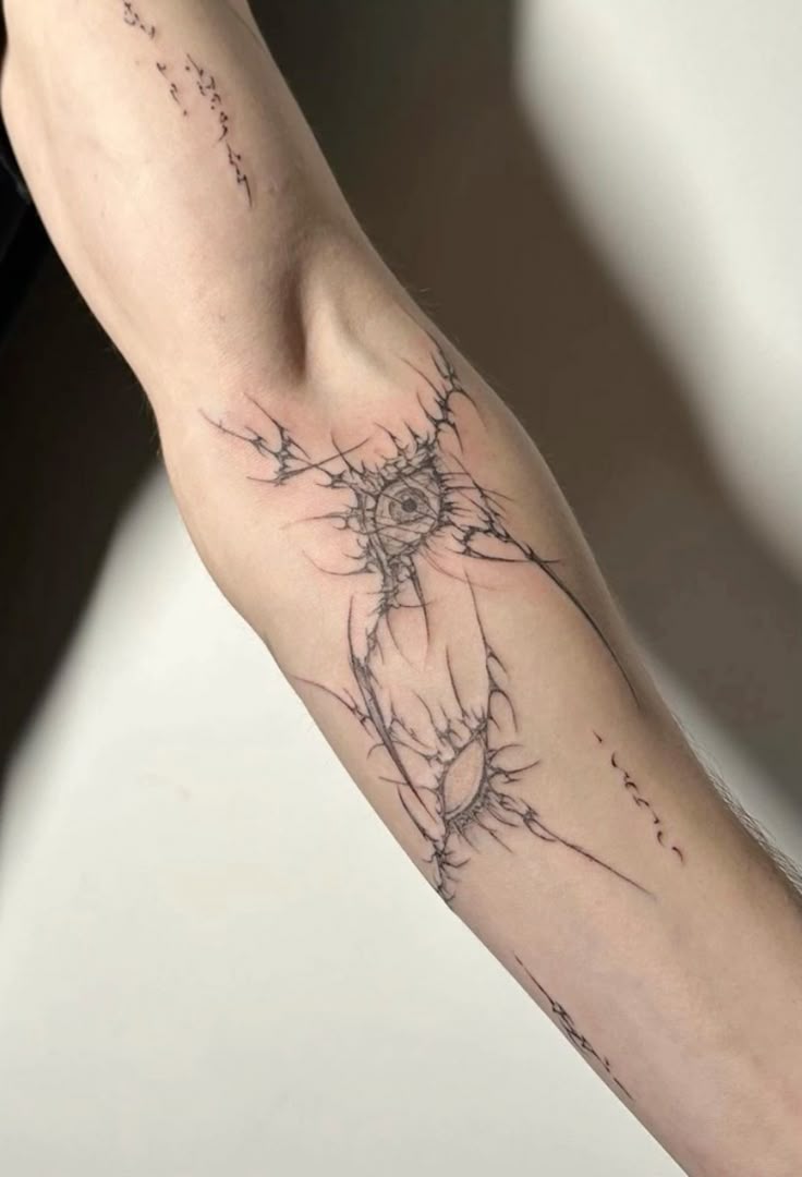 Intricate Blackwork Arm Tattoo Design