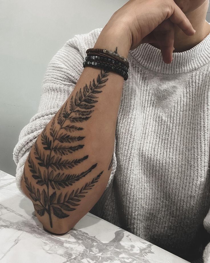 Elegant Fern Arm Tattoo Design