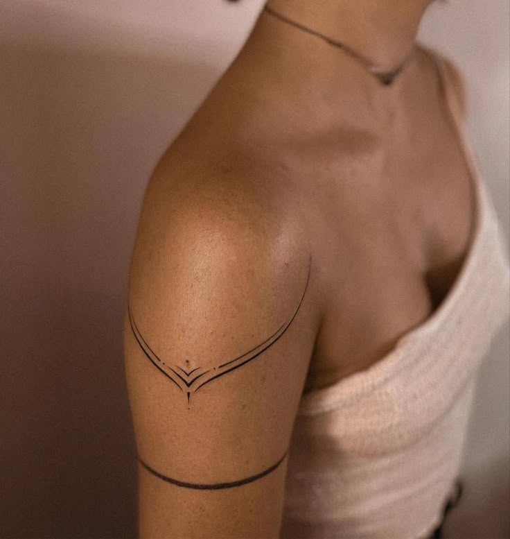 Elegant Minimalist Yoga Tattoo for the Arm