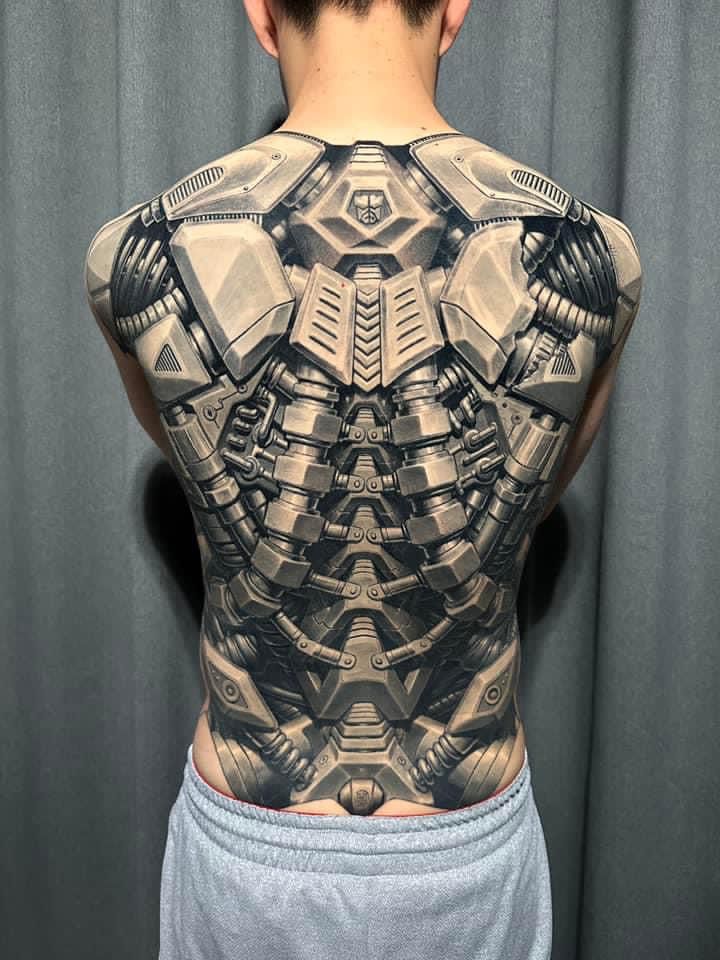 Stunning Biomechanical Back Tattoo Design