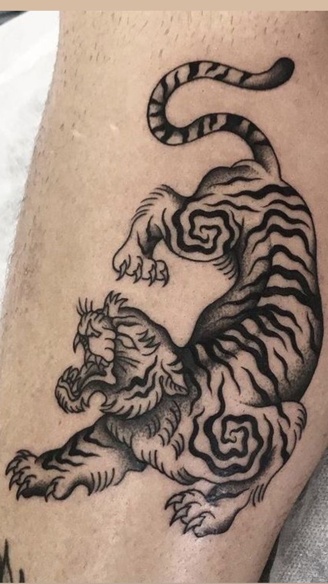 Dynamic Tiger Blackwork Tattoo