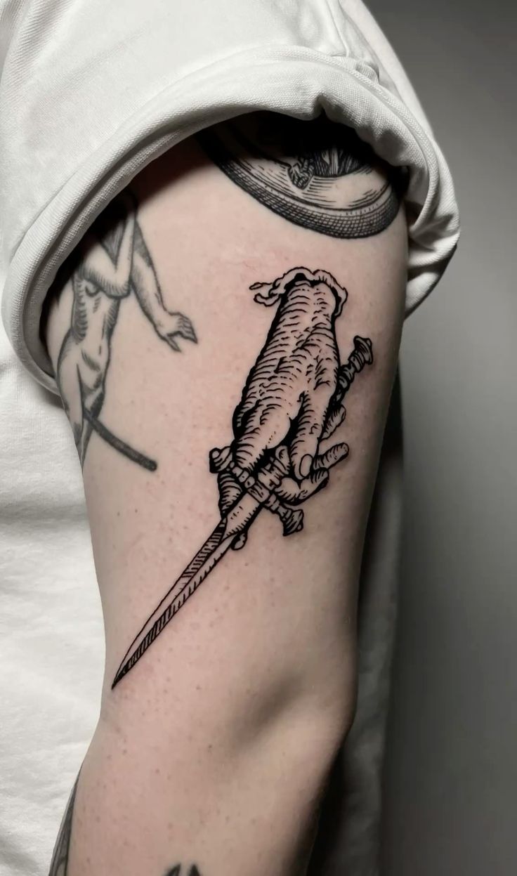 Bold Hand and Sword Tattoo for Arm