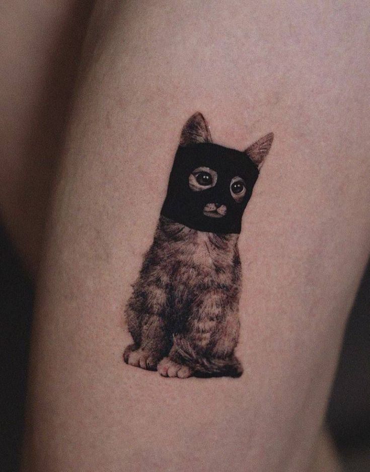Masked Cat Tattoo: A Unique Blend of Realism and Whimsy