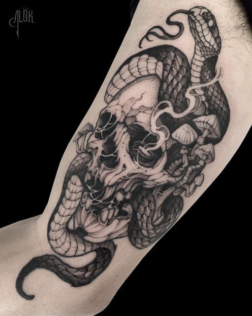 Intricate Skull and Snake Tattoo Design