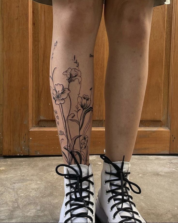 Stunning Blackwork Floral Leg Tattoo