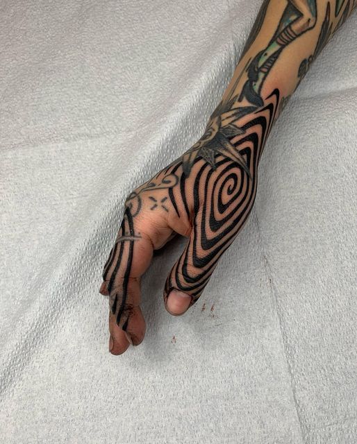 Bold Abstract Blackwork Hand Tattoo