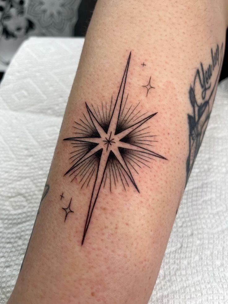 geometric star blackwork tattoo