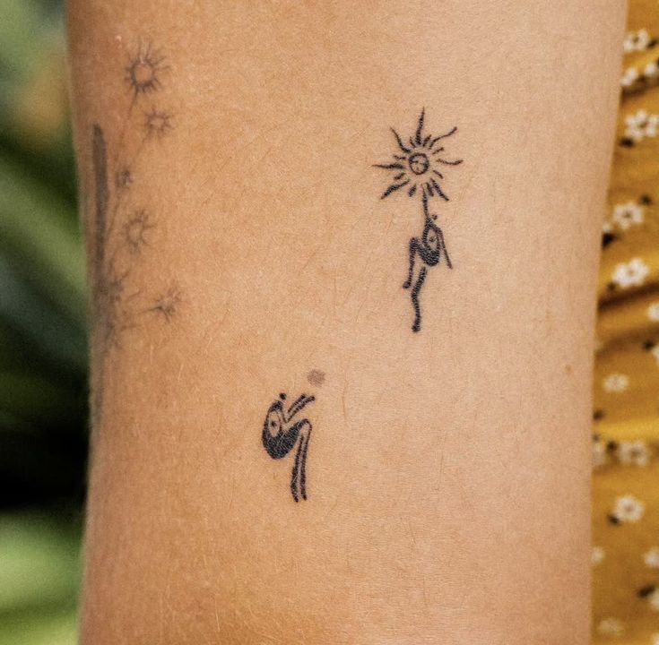 Minimalist Blackwork Arm Tattoo