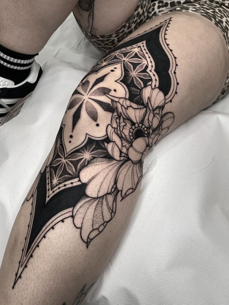 Intricate Blackwork Knee Tattoo Design