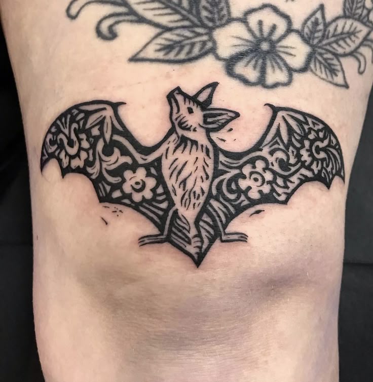 Spooky Floral Bat Tattoo