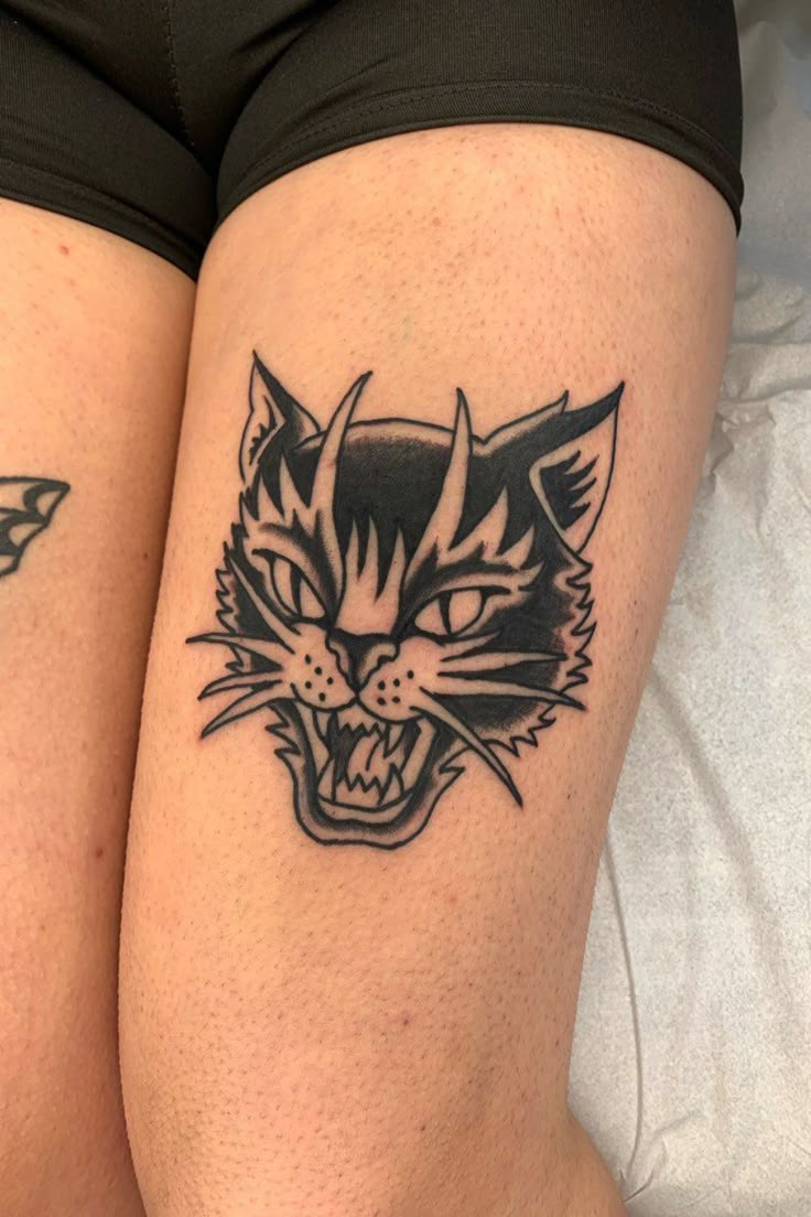 Fierce Cat Blackwork Tattoo for Bold Statements