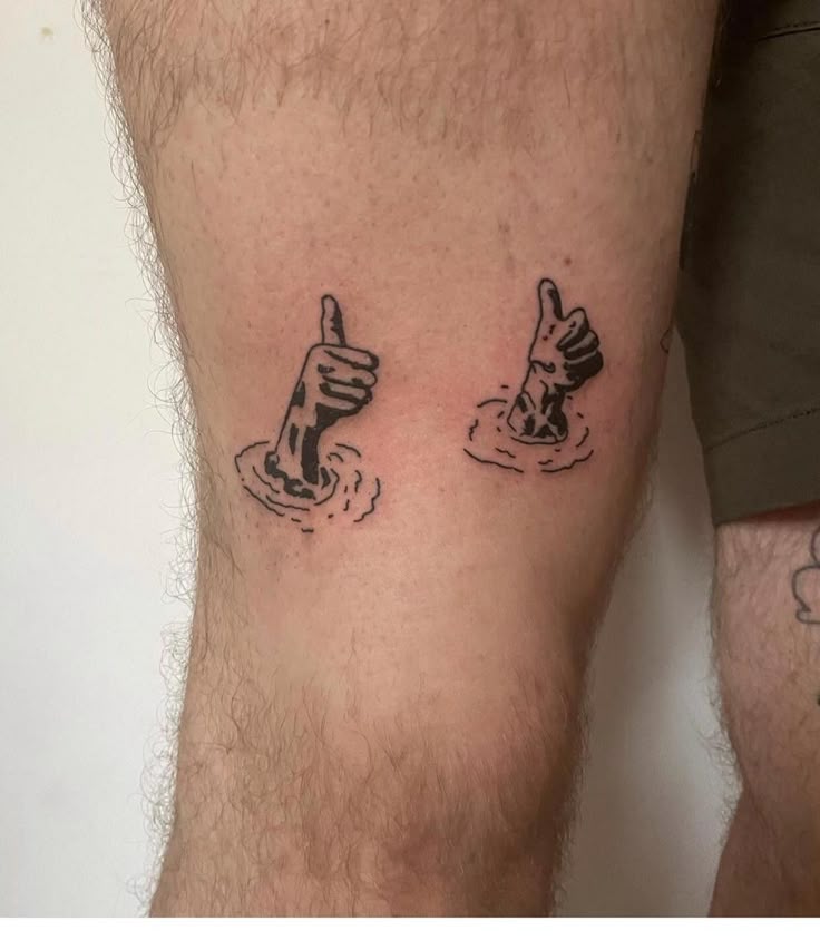 Thumbs Up Calf Tattoo - A Minimalist Expression
