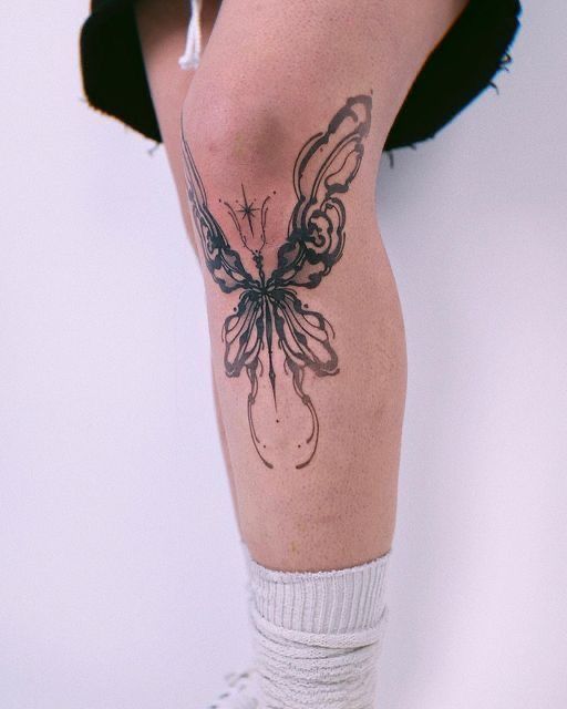 Elegant Butterfly Calf Tattoo Idea