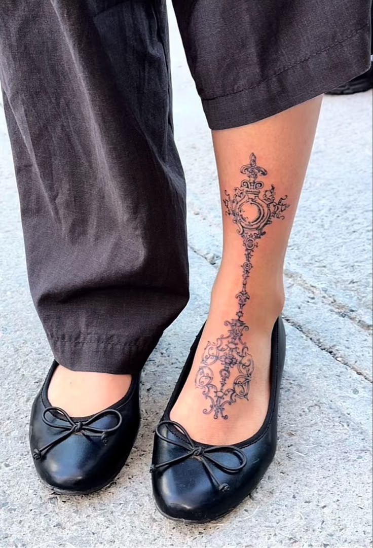 Elegant Blackwork Calf Tattoo