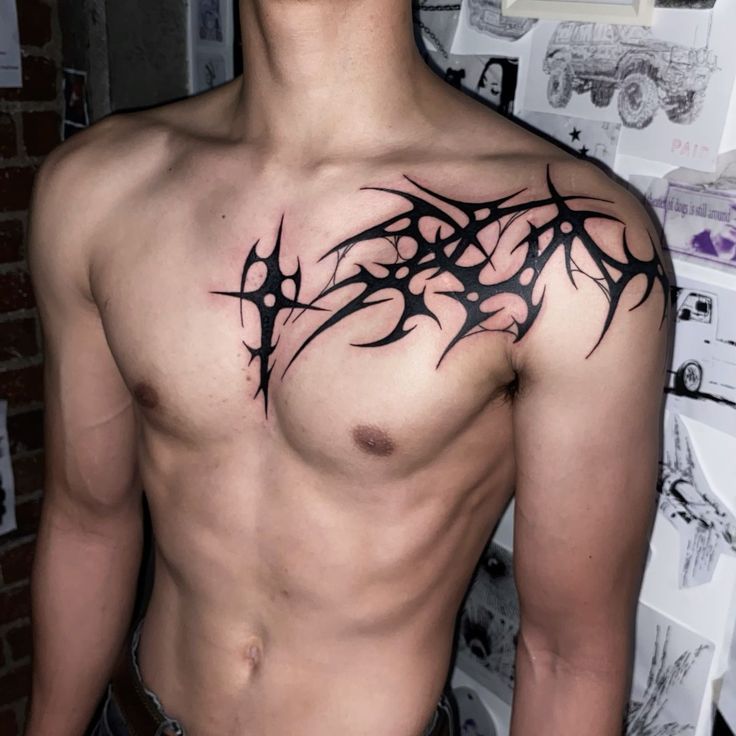 bold tribal chest tattoo design
