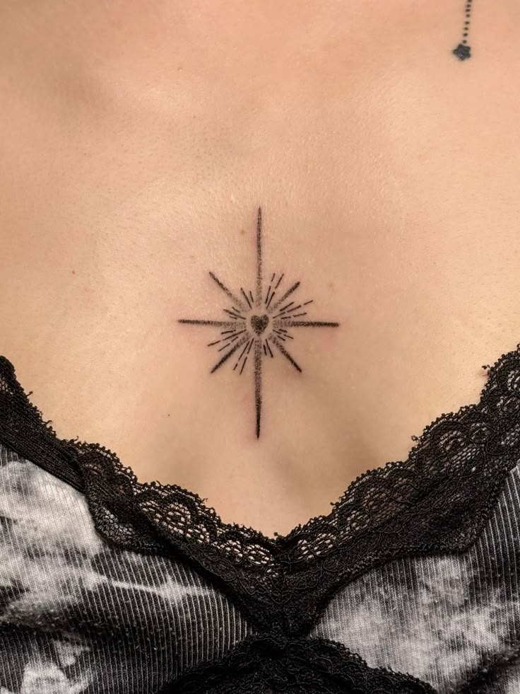 minimalist star chest tattoo design