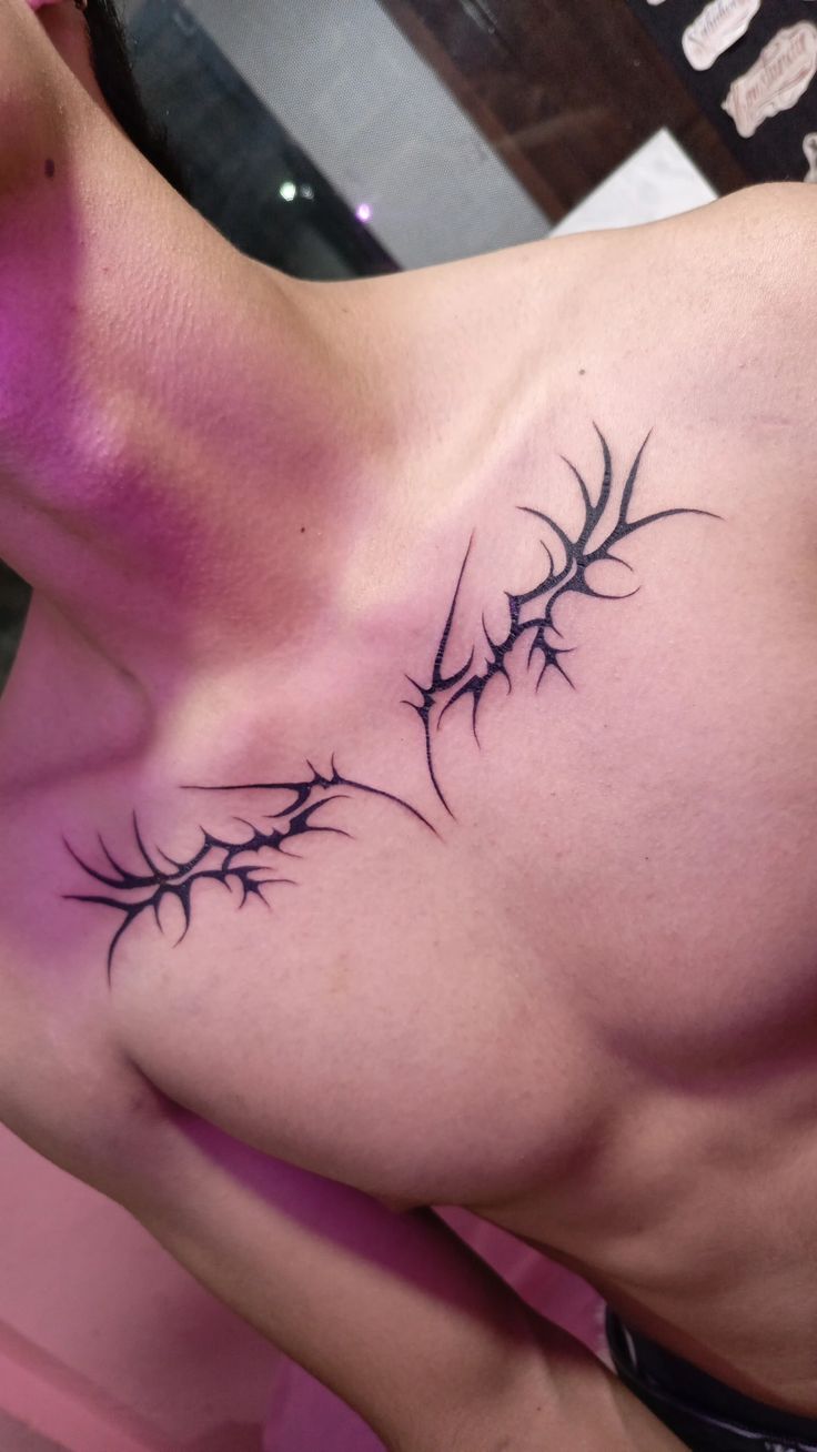 abstract blackwork chest tattoo design