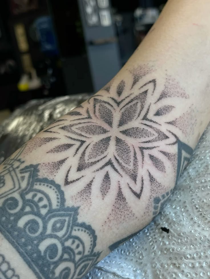 Elegant Dotwork Floral Tattoo