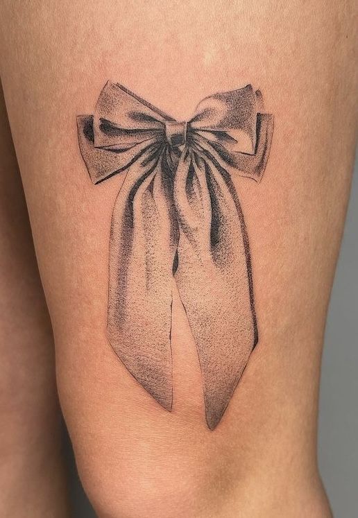 Elegant Bow Tattoo for a Chic Look