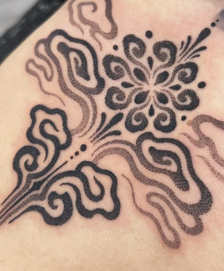 Elegant Dotwork Floral Tattoo Design